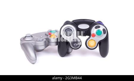 Video game controllers on white background Stock Photo