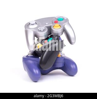 Video game controllers on white background Stock Photo