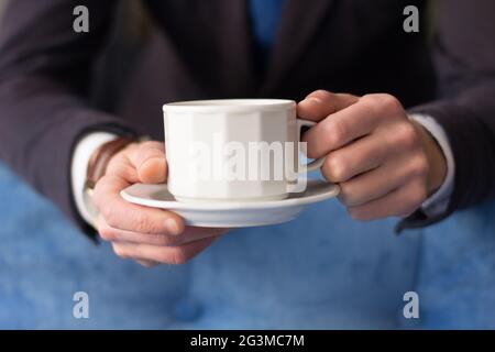 Thoughtful businessman having coffee Stock Photo