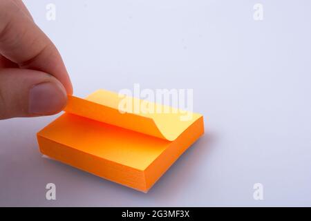 Post note sticker for taking notes in hand Stock Photo