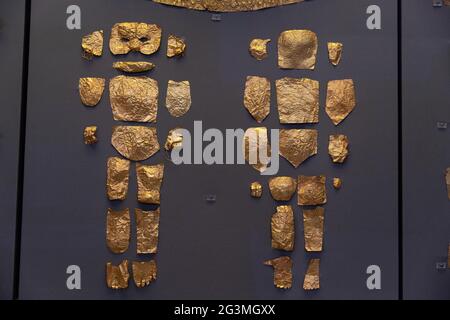 (210617) -- ATHENS, June 17, 2021 (Xinhua) -- Photo taken on June 7, 2021 shows unique gold coverings for the body and the face of an infant, consisting of pieces of gold foil, which were excavated at Mycenae and dated from the 16th century BC, at the National Archaeological Museum, in Athens, Greece. The imposing golden mask of Agamemnon welcomes visitors at the National Archaeological Museum here, standing out among other finds from the royal cemetery of the ancient city of Mycenae on the Peloponnese peninsula dating back to the 16th century BC. TO GO WITH 'Interview: Ancient Greek golden Stock Photo