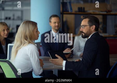 Businessteam working together on project Stock Photo