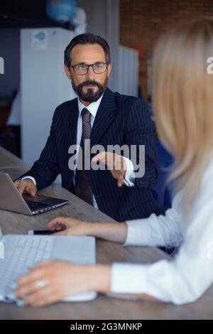 Businessteam working together on project Stock Photo
