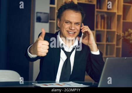 Handsome businessman working from home Stock Photo