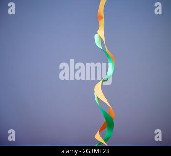 Green and yellow stripe on blue background Stock Photo