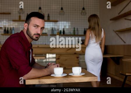 Quarrel between loved young man and woman. Stock Photo