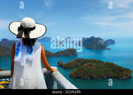 woman with white hat at the view point of ang thong national national park in thailand Stock Photo