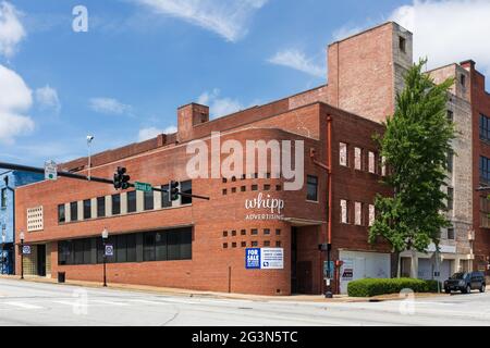 SPARTANBURG, SC, USA-13 JUNE 2021: The Whipp Advertising building on Broad Street, for sale or lease.  Horizontal image. Stock Photo