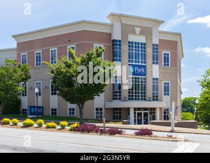 SPARTANBURG, SC, USA-13 JUNE 2021:  Building, signs and logo of the Park National Bank in Spartanburg.   Horizontal image. Stock Photo