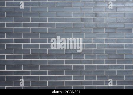 gray clinker brick wall background - modern building exterior with ...