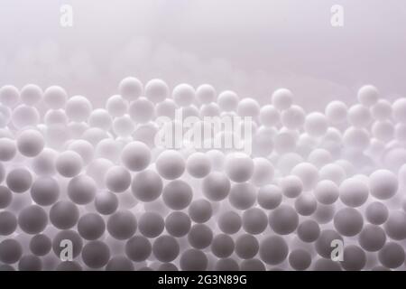 White polystyrene foam balls as background Stock Photo