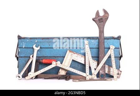 Old toolbox filled with vintage tools Stock Photo