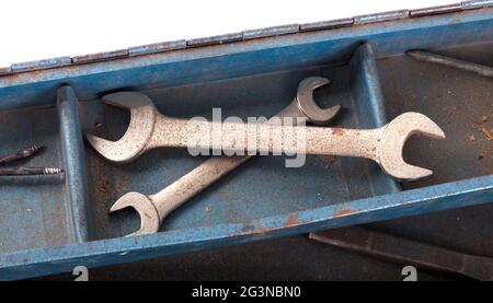 Old toolbox filled with vintage tools Stock Photo