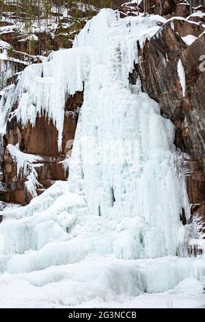 Frozen waterfall inside a cave on the shore of Lake Superior, Apostle ...