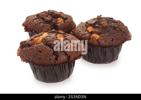 Studio shot of chocolate chip muffin cut out against a white background - John Gollop Stock Photo