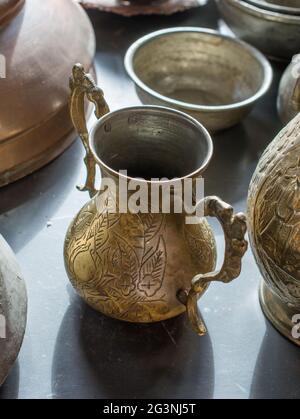 Very old style metal ewer water jar Stock Photo