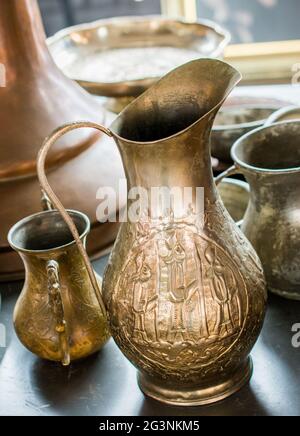 Very old style metal ewer water jar Stock Photo