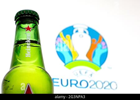 Spain. 16th June, 2021. In this photo illustration a Heineken beer bottle seen displayed in front of a UEFA Euro 2020 logo in the background. (Photo by Thiago Prudencio/SOPA Images/Sipa USA) Credit: Sipa USA/Alamy Live News Stock Photo