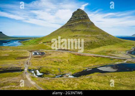 Aerial view of Kirkjufell mountain landscape and waterfalls below in Iceland Stock Photo