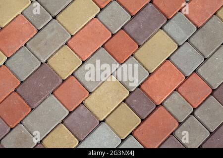 Photo of multi-colored paving stones pattern and background Stock Photo