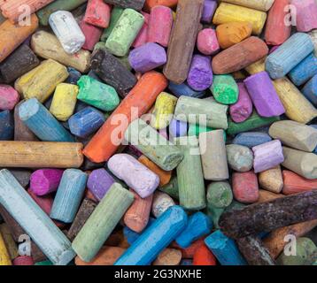 Abstract background of multicolored used crayons. Concept of art and creativity. Stock Photo