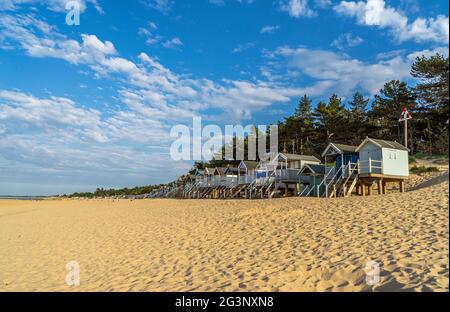 Evening light on the beach huts at Wells-next-the-sea Stock Photo