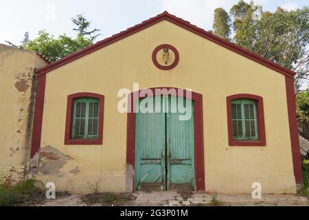 Old red exterior wooden doors with a wooden closed sign Stock Photo - Alamy
