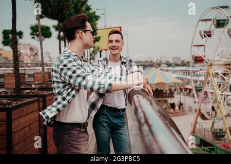 Two Guys Talking In The City Park Stock Photo