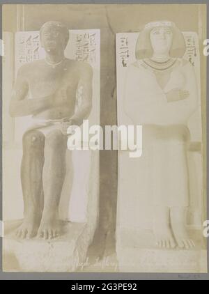 Images of a pharaohonon and a queen in the museum of Giza; Musée De Guizeh - Le Fils Royal Ra Kdep et La Dame du Roi (...). Part of travel album with pictures of sights in Greece and Egypt. Stock Photo