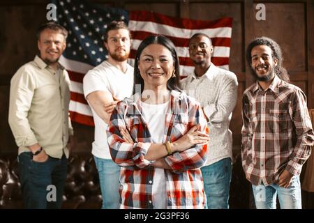 Multi-Ethnic Team Of Young American Entrepreneurs Rejoices In Successful Start Up Stock Photo