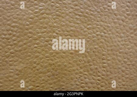 Abstract background. A close-up of faux leather brown. Stock Photo
