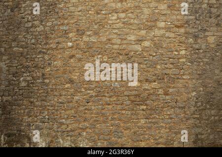 Brick wall of an old ashlar castle. Stock Photo