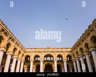 Open, arcaded courtyard of a hall with a blue sky in the ancient Tirumalai Nayak Palace. Stock Photo