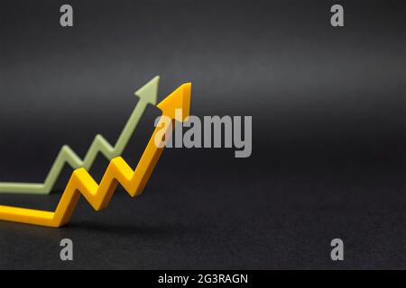 An uptrend, increased sales, or increased value. graphic arrows pointing upwards on black background for banner, design or text insert. Stock Photo