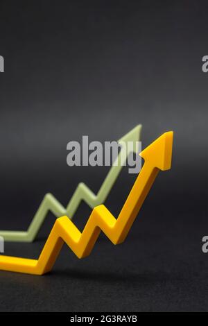 An uptrend, increased sales, or increased value. graphic arrows pointing upwards on black background for banner, design or text insert. Stock Photo