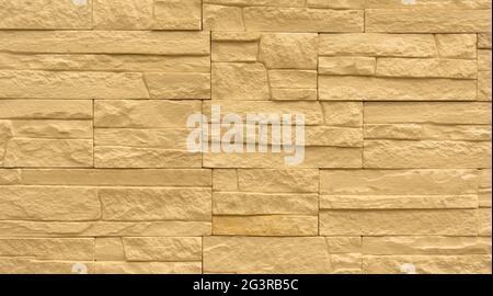 White cream marble stone limestone brick tile wall surface aged texture detailed pattern background Stock Photo