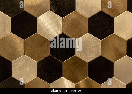 Golden hexagon cell tiling on the luxury decoration interior Gold metal honeycomb, hexagon, abstract metal background Stock Photo