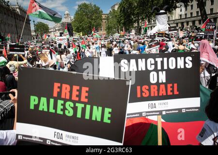 Whitehall, London, UK. 12th June 2021. Thousands of demonstrators stage a protest outside Downing Street in London to coincide with the G7 summit taki Stock Photo