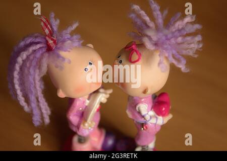 Toy of boy and girl with presents Stock Photo