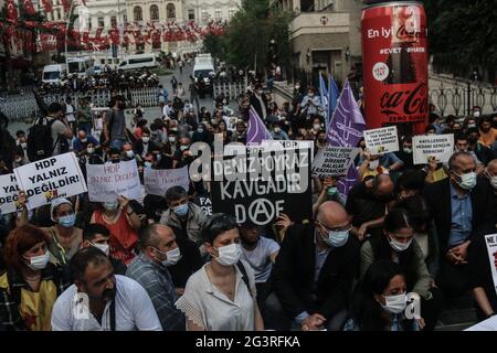 Istanbul, Turkey. 17th June, 2021. Protesters hold placards during a demonstration.People held a protest against Armed Attack on Peoples' Democratic Party Izmir Office, the armed attacker Onur Gencer, who came to the headquarters of the pro-Kurdish Peoples' Democratic Party in Izmir at around 11:00 am today, killed a 40-year-old employee Deniz Poyraz. In his first statement, the attacker said that he carried out the attack because he hated the Kurdistan Workers Party and that he planned to kill more people. Credit: SOPA Images Limited/Alamy Live News Stock Photo