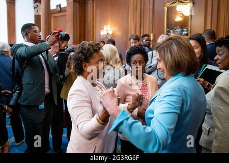 Speaker of the United States House of Representatives Nancy Pelosi (Democrat of California), right, United States Representative Barbara Lee (Democrat of California), left, and United States Representative Sheila Jackson-Lee (Democrat of Texas), center, celebrate the signing of bill S. 475, the Juneteenth National Independence Day Act at the US Capitol in Washington, DC, Thursday, June 17, 2021. Credit: Rod Lamkey/CNP /MediaPunch Stock Photo