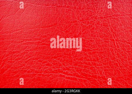 Background image - red leather with an abstract texture. Stock Photo