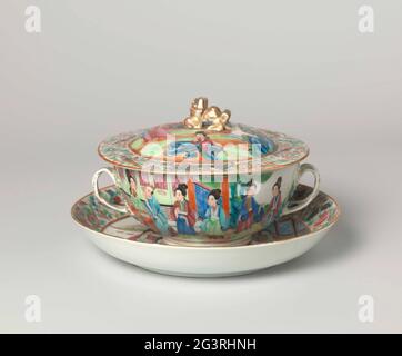 Turen With Stand With Figures on a Terrace near a Pavilion. Terrine with lid and on saucer of porcelain with two braided ears, painted on the glaze in blue, red, pink, green, yellow, black and gold. On the flat of the dish a group of sitting and standing ladies on a fenced terrace for a pavilion on the waterfront; Blooming plants, bird, butterflies and bats on the wall. The terrine with two different representations of a group of ladies and a seated man; The lid with a sitting woman in a garden, two standing people with a range and two ladies looking from the window of the pavilion; Lid knob i Stock Photo