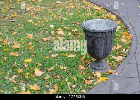 Street waste bin in city park Stock Photo