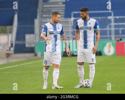 Timo Perthel and JÃ¼rgen Gjasula both 1.FC Magdeburg DFB 3.Liga Season 2020-21 Stock Photo
