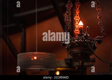 Aged grungy chandelier and lamps with dust and spider webs Stock Photo