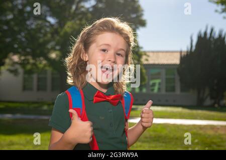 Funny nerd kid. Back to school and schooling. Little schoolboy pupil back to school at knowledge day. Stock Photo