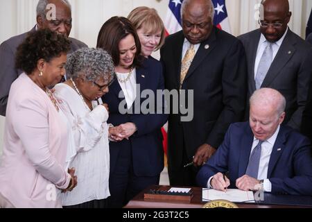 United States Vice President Kamala Harris (Fourth From Left) poses for a photo as US President Joe Biden (right) signs the Juneteenth National Independence Day Act into law in the East Room of the White House on June 17, 2021 in Washington, DC. Credit: Oliver Contreras/Pool via CNP /MediaPunch Stock Photo