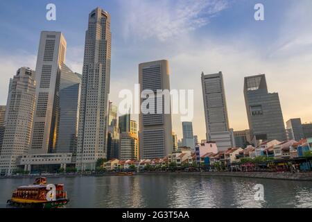 Sunset on the Quay of Singapore with Skyscrapers Stock Photo