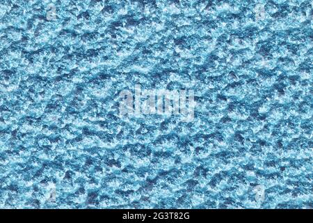 The rough surface of cement plaster background. Empty surface close-up. Stock Photo